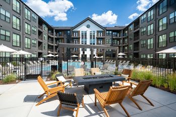 Three firepit lounge courtyards with plush seating and outdoor entertainment space